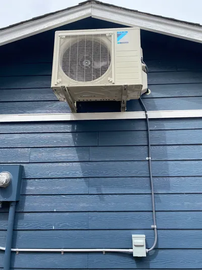 Second Daikin outdoor condenser unit installation